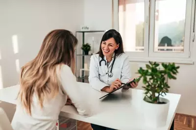 woman meeting with doctor