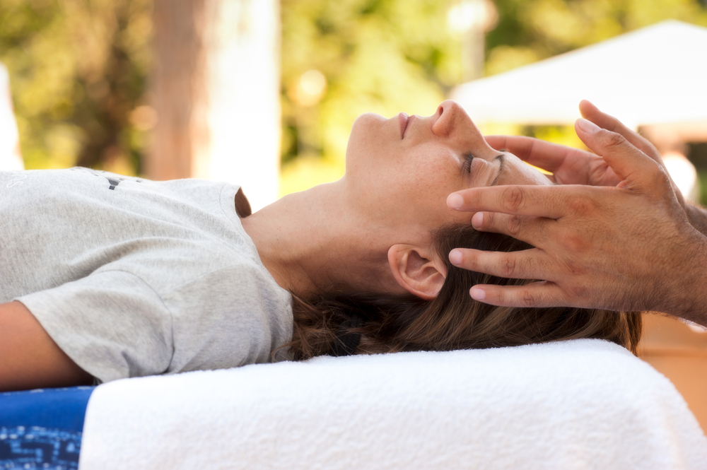 hands on woman's head